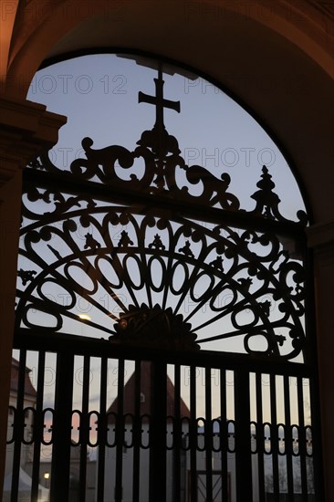 Wrought-iron grille in front of the imperial staircase