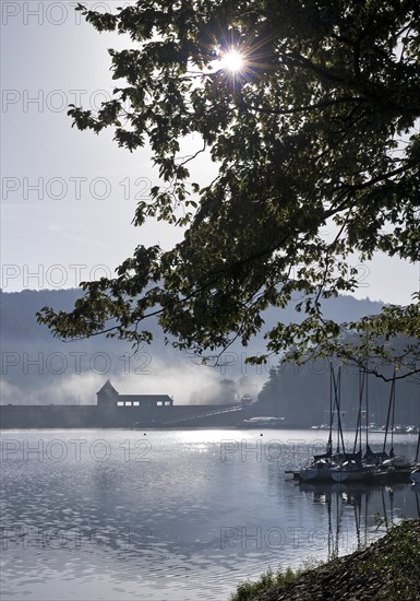 Eder dam with dam wall and pleasure boats on the Edersee