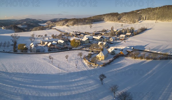 Aerial view of Schwarzensee church in winter