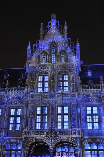 Monumental light projections on facade of Post Plaza by the French artist group Spectaculaires during the 2011 light festival of Ghent