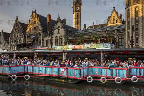 Visitors on grandstand at the Graslei watching the Pole Pole podium during the Gentse Feesten