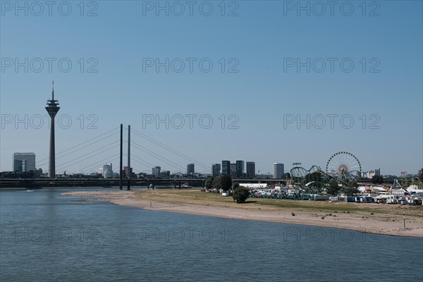 View over the Rhine with television tower and Rhine funfair