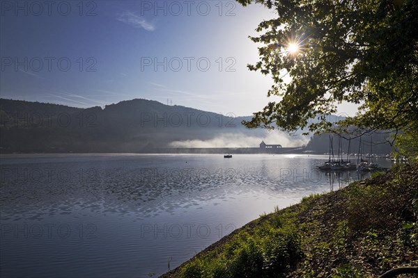 Eder dam with dam wall and pleasure boats on the Edersee