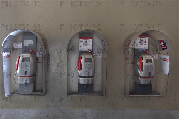 Public telephone booths under arcades