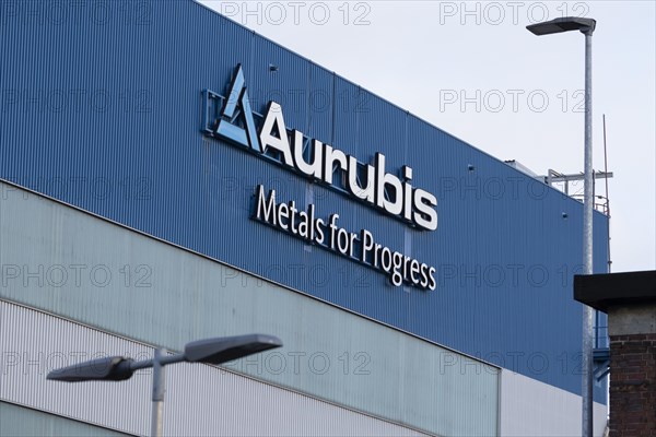 Logo and lettering Aurubis Metal for Progress on a factory building at the Aurubis AG plant