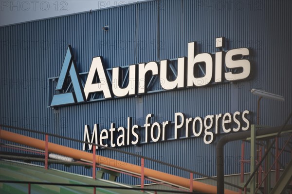 Logo and lettering Aurubis Metal for Progress on a factory building at the Aurubis AG plant