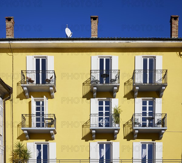 Light yellow facade with windows