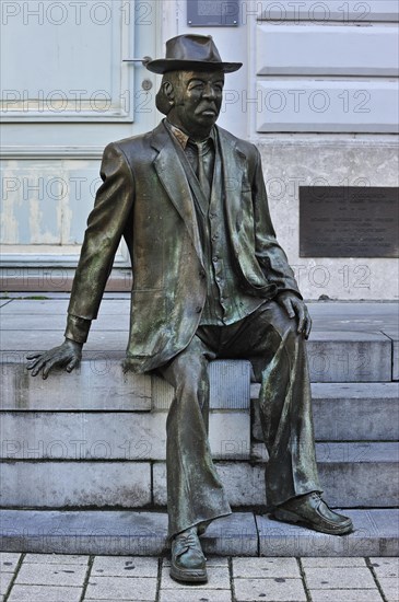 Statue of actor comedian Romain De Coninck in front of the Minard Theatre at Ghent