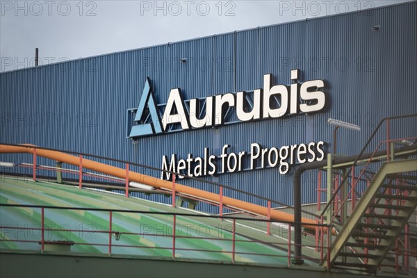 Logo and lettering Aurubis Metal for Progress on a factory building at the Aurubis AG plant