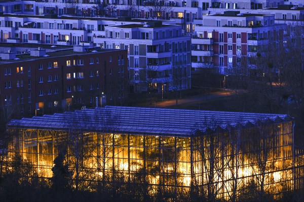 View of the illuminated tropical hall in the Gardens of the World