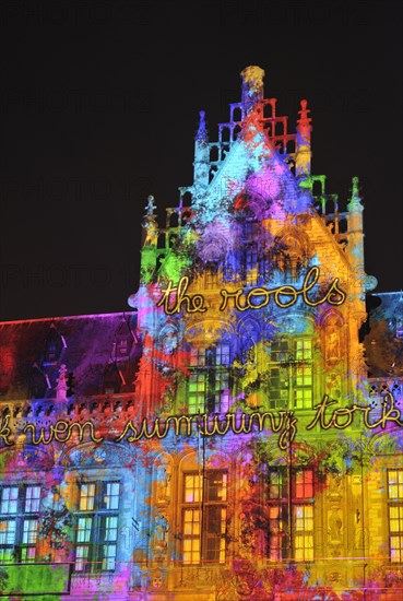 Monumental light projections on facade of Post Plaza by the French artist group Spectaculaires during the 2011 light festival of Ghent