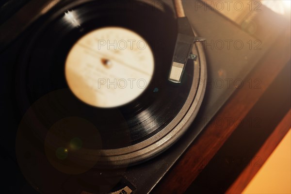 Vinyl record on retro turntable