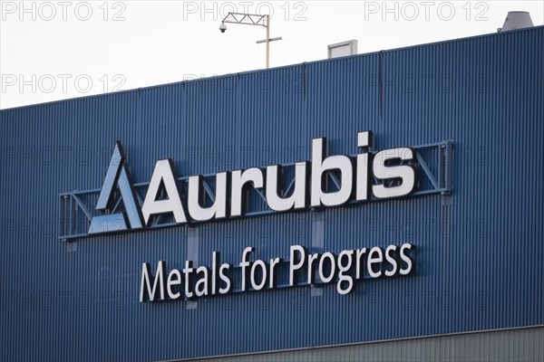 Logo and lettering Aurubis Metal for Progress on a factory building at the Aurubis AG plant