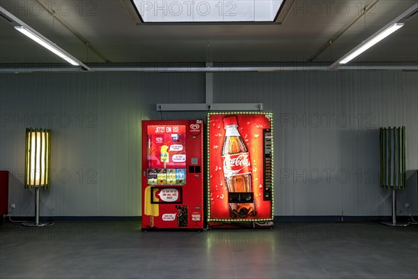 Vending machines for Langnese ice cream and Coca-Cola soft drinks in a waiting room