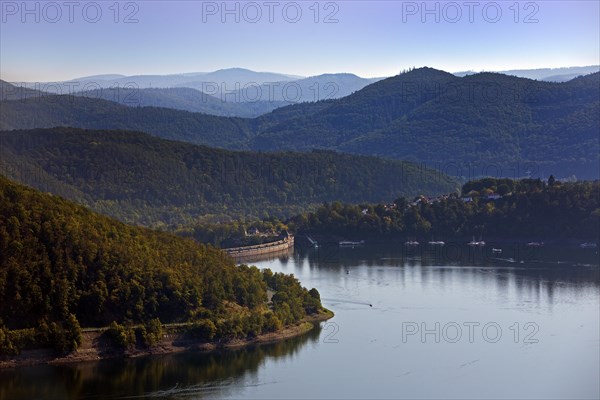 Elevated view of the Edertalsperre dam with the dam wall and a wide view of the Kellerwald-Edersee National Park