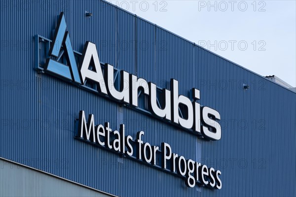 Logo and lettering Aurubis Metal for Progress on a factory building at the Aurubis AG plant