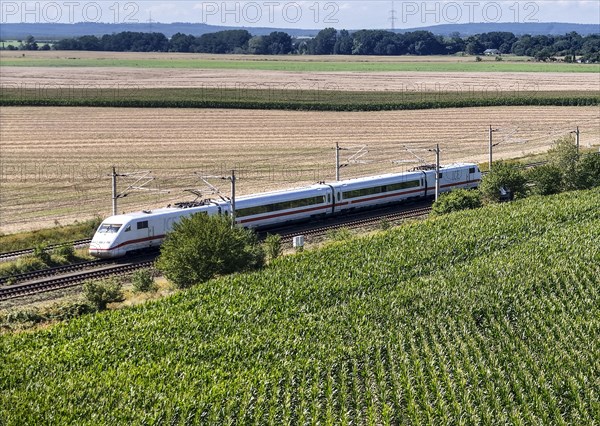 An ICE with two wagons on the open track