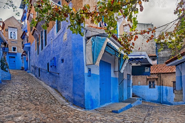 Narrow alleyways with blue walls