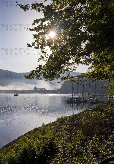 Eder dam with dam wall and pleasure boats on the Edersee