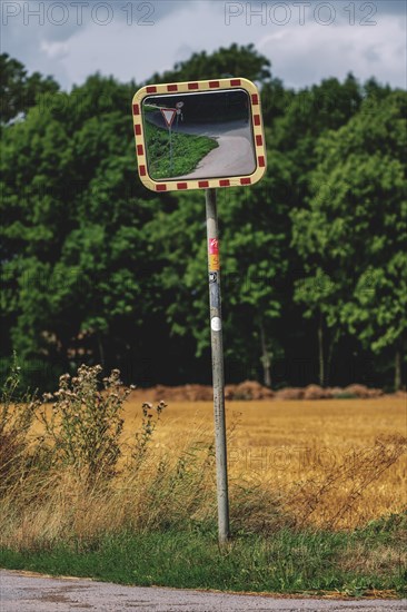 Traffic mirror on a rural road next to fields, Osterholz, Wuppertal, North Rhine-Westphalia, Germany, Europe