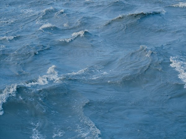 Blue sea water surface background