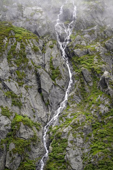 Mountain stream flowing down a steep rocky slope, waterfall, Berliner Hoehenweg, Zillertal, Tyrol, Austria, Europe