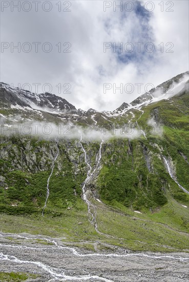Mountain streams flow over steep mountain slopes into the Schlegeisgrund valley, cloudy rocky mountains, Furtschaglhaus, Berliner Hoehenweg, Zillertal, Tyrol, Austria, Europe