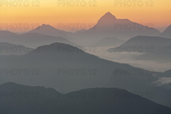 Morning atmosphere over mountain ranges, twilight, haze, fog, backlight, view from Jochberg to Guffert, Bavarian Alps, Bavaria, Germany, Europe