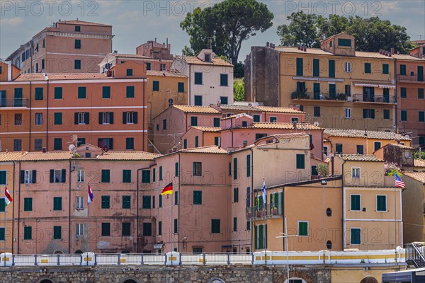 Interlocking houses with pastel-coloured facades in Rio Marina, Elba, Tuscan Archipelago, Tuscany, Italy, Europe