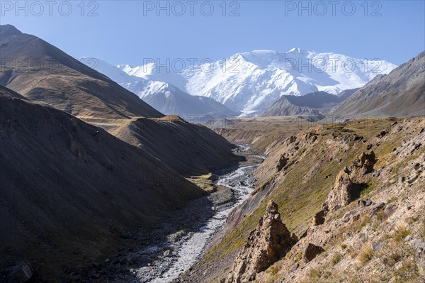 Valley with river Achik Tash between high mountains, mountain landscape with peak Pik Lenin, Osh province, Kyrgyzstan, Asia