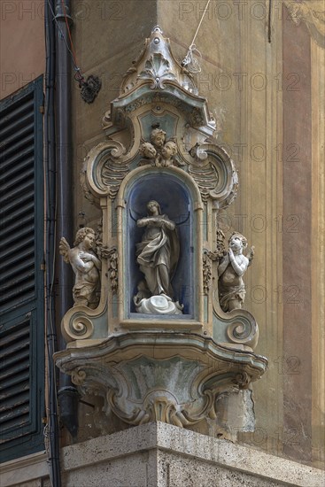 Veneration of the Virgin Mary with angel figures on a corner house, in the historic centre, Genoa, Italy, Europe