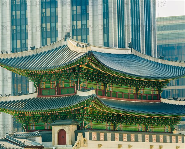 Seoul, South Korea, March 18, 2017:Gyeong Bok Gung Palace gate building set against a background of modern office buildings in downtown Seoul, South Korea, Asia