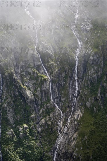 Cloudy mountain landscape, mountain streams as waterfalls on a mountain slope, Furtschaglhaus, Berliner Hoehenweg, Zillertal, Tyrol, Austria, Europe