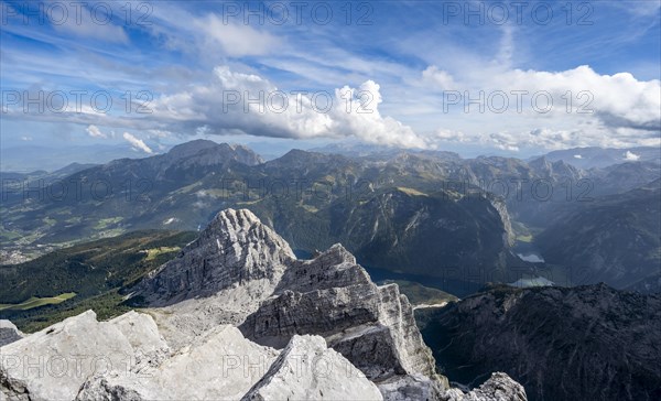 View from the rocky summit of the Watzmann Mittelspitze, view of mountain panorama with Steinernes Meer and Koenigssee, Kleiner Watzmann and Watzmann Kinder, Watzmann crossing, Berchtesgaden National Park, Berchtesgaden Alps, Bavaria, Germany, Europe