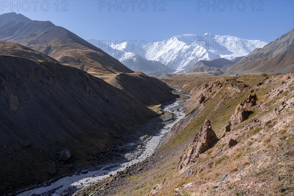 Valley with river Achik Tash between high mountains, mountain landscape with peak Pik Lenin, Osh province, Kyrgyzstan, Asia