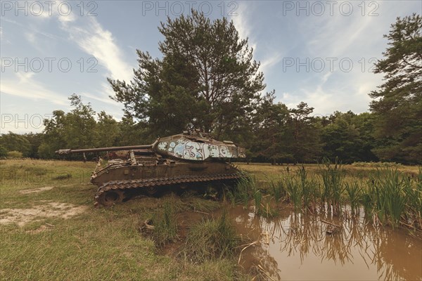 A tank by day at a pond, surrounded by trees and extensive nature, M41 Bulldog, Lost Place, Brander Wald, Aachen, North Rhine-Westphalia, Germany, Europe
