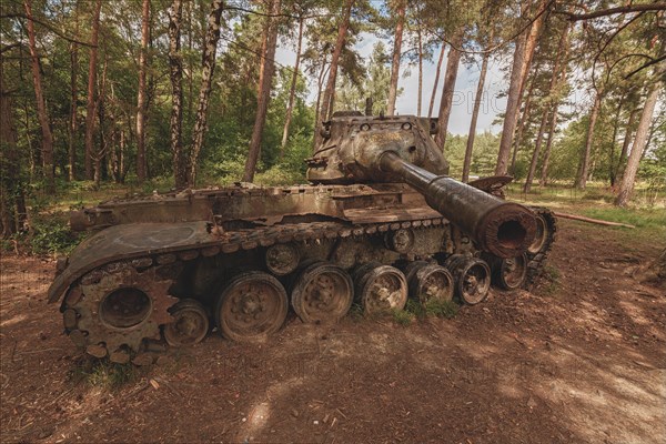 Old tank in the forest with sunbeams shining through the trees, M47 Patton, Lost Place, Brander Wald, Aachen, North Rhine-Westphalia, Germany, Europe