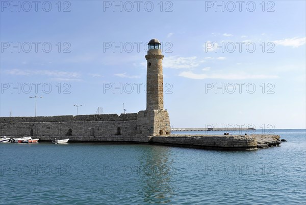 Venetian harbour, Venetian lighthouse, boats, water reflection, Rethimnon, central Crete, island of Crete, Greece, Europe
