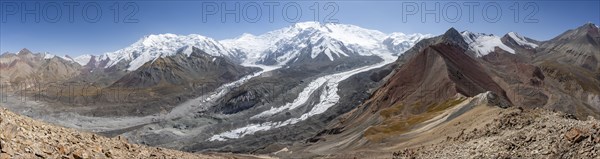 Panorama, high mountain landscape with glacier moraines and glacier tongues, glaciated and snow-covered mountain peaks, Lenin Peak and Peak of the XIX Party Congress of the CPSU, Traveller's Pass, Trans Alay Mountains, Pamir Mountains, Osh Province, Kyrgyzstan, Asia