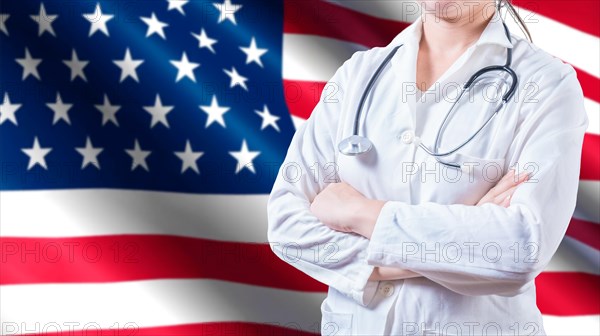 Female doctor with stethoscope on American flag. Unrecognizable female doctor with arms crossed on American flag, Health and care with the flag of United State