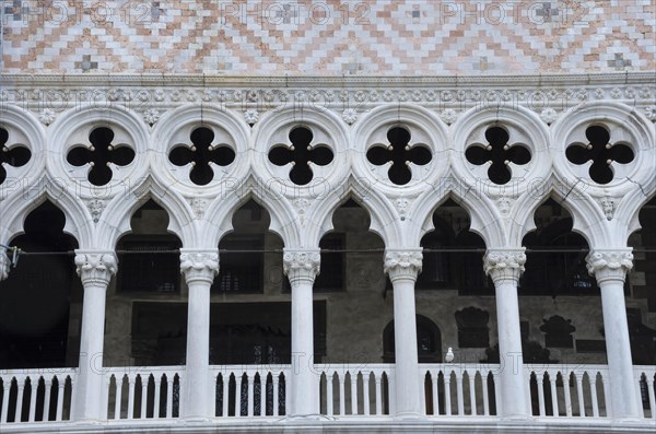 Detail of Doge's Palace (Palazzo Ducale) facade, famous tourist attraction in Venice, Italy, front view closeup, Europe