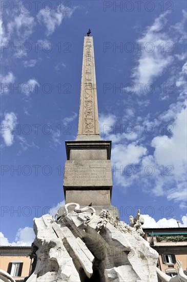 Obelisk above the fountain Fontana dei Quattro Fiumi, four-stream fountain, also known as Obelisco Agonale, Piazza Navona, Rome, Lazio, Italy, Europe