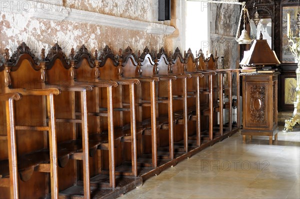 Interior row of chairs, monastery church, Arkadi Monastery, Moni Arkadi, national monument, Crete, Greece, Europe