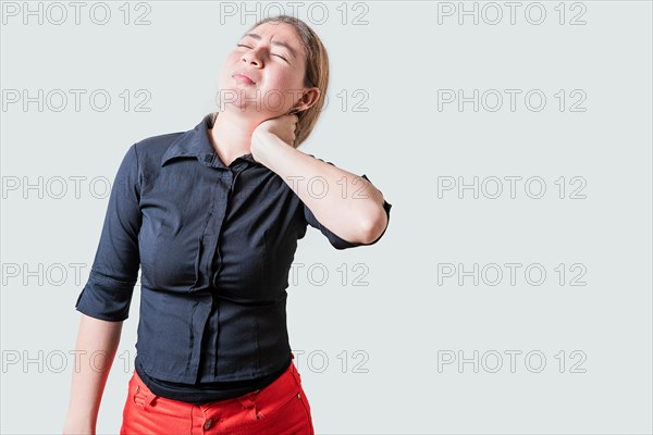 Young woman with muscle tension and neck pain isolated. Stress and neck pain concept, Girl suffering from neck pain isolated
