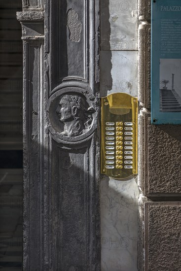 Relief of a bust of a Caesar on the entrance portal of a former palazzo, historic centre, Genoa, Italy, Europe