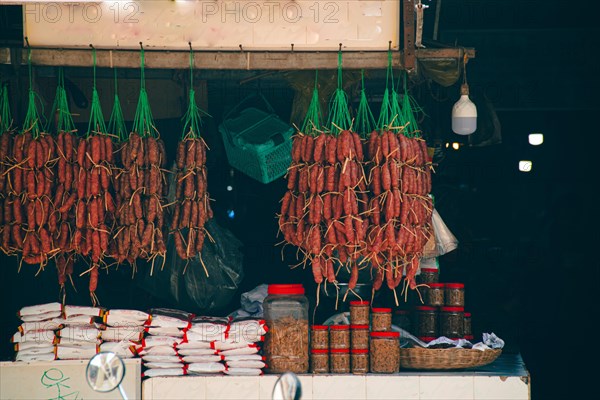 Small shop displaying traditional pork and beef sausages called twa koh, kwah koh or sach krok, authentic khmer cuisine and culture of Cambodia. Siem reap, Cambodia, Asia