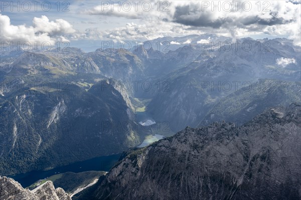 View from the summit of the Watzmann Mittelspitze, view of mountain panorama with Steinernes Meer, Koenigssee and Obersee, Watzmann crossing, Berchtesgaden National Park, Berchtesgaden Alps, Bavaria, Germany, Europe