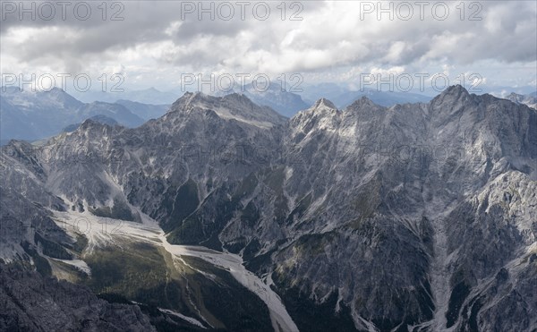 View of Wimbachgries valley and mountain panorama with rocky mountain peak of the Hochkalter, at the summit of the Watzmann Mittelspitze, Berchtesgaden National Park, Berchtesgaden Alps, Bavaria, Germany, Europe