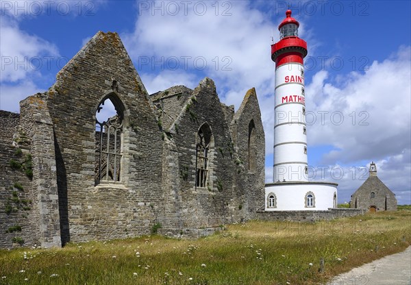Ruins of the Saint-Mathieu abbey and lighthouse on the Pointe Saint-Mathieu, Plougonvelin, Finistere department, Brittany region, France, Europe