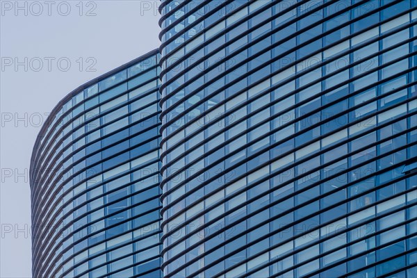 Tall highrise office building with glass exteriors in downtown Seoul, South Korea, Asia